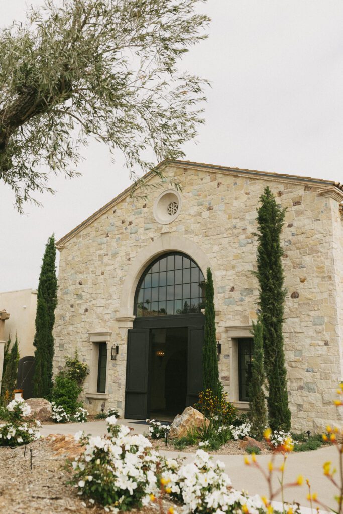Stone chapel entrance at European-inspired wedding venue in San Diego