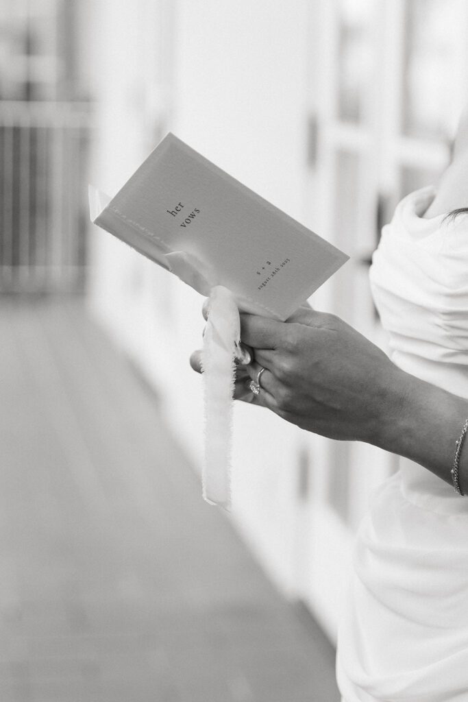 A close-up of a bride's private vows book is photographed at valencia in la jolla