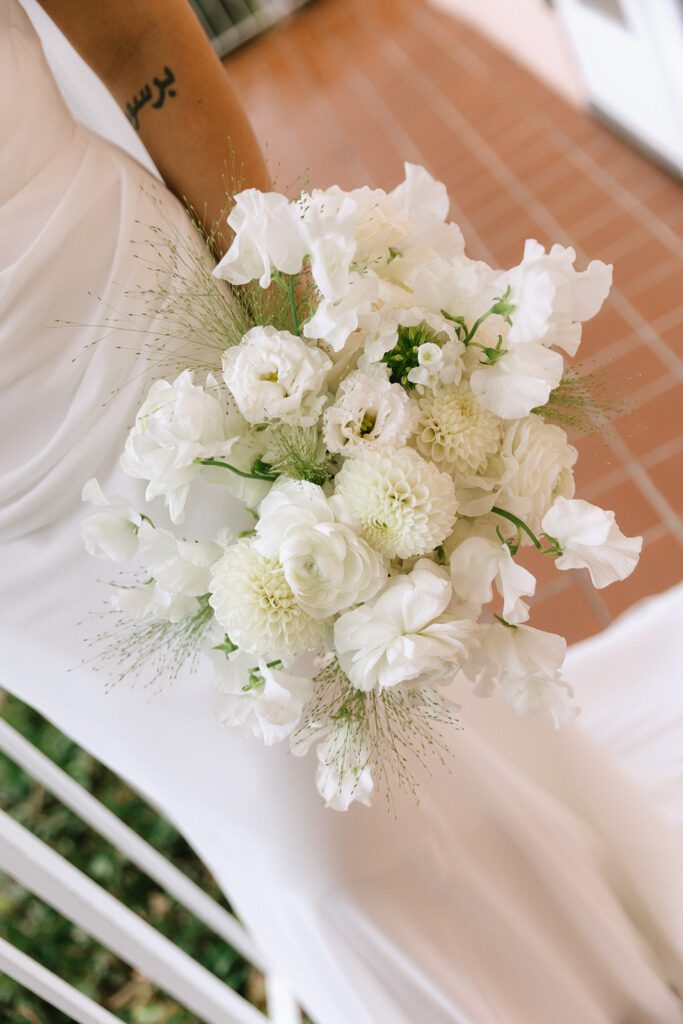 A white bridal boquet is photographed at wedding in la jolla